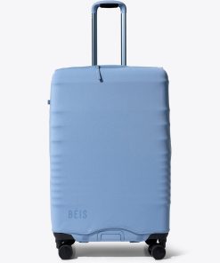 The Hybrid Check-In Luggage Cover in Dusty Blue