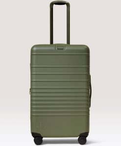 The Medium Check-In Roller in Olive